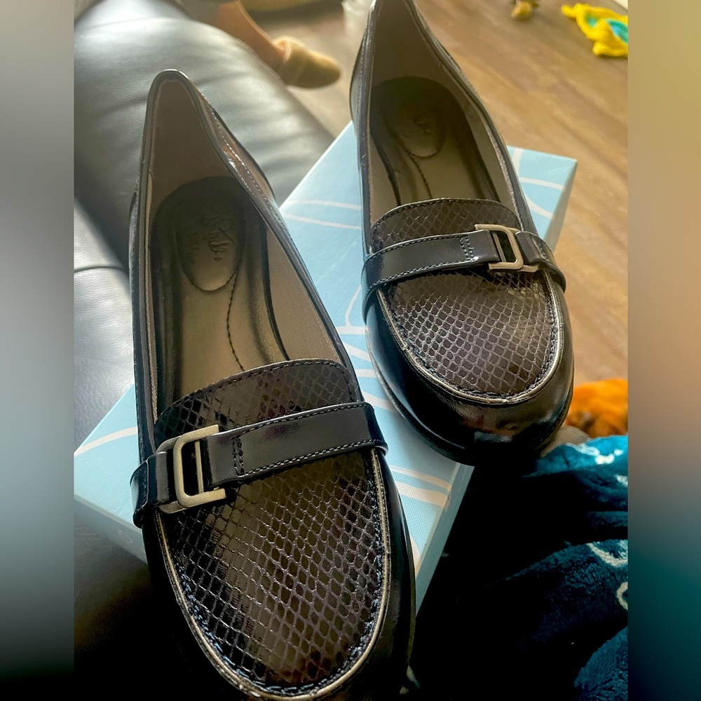 Brand new in the box Navy loafers. Never worn